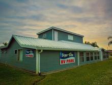 Starlite RV Park clubhouse on a sunset view